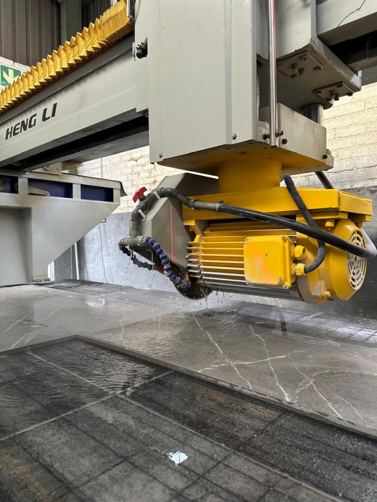 Machinery cutting stone in Trend Stone factory