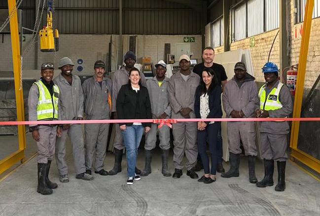 Trend Stone team in factory cutting ribbon