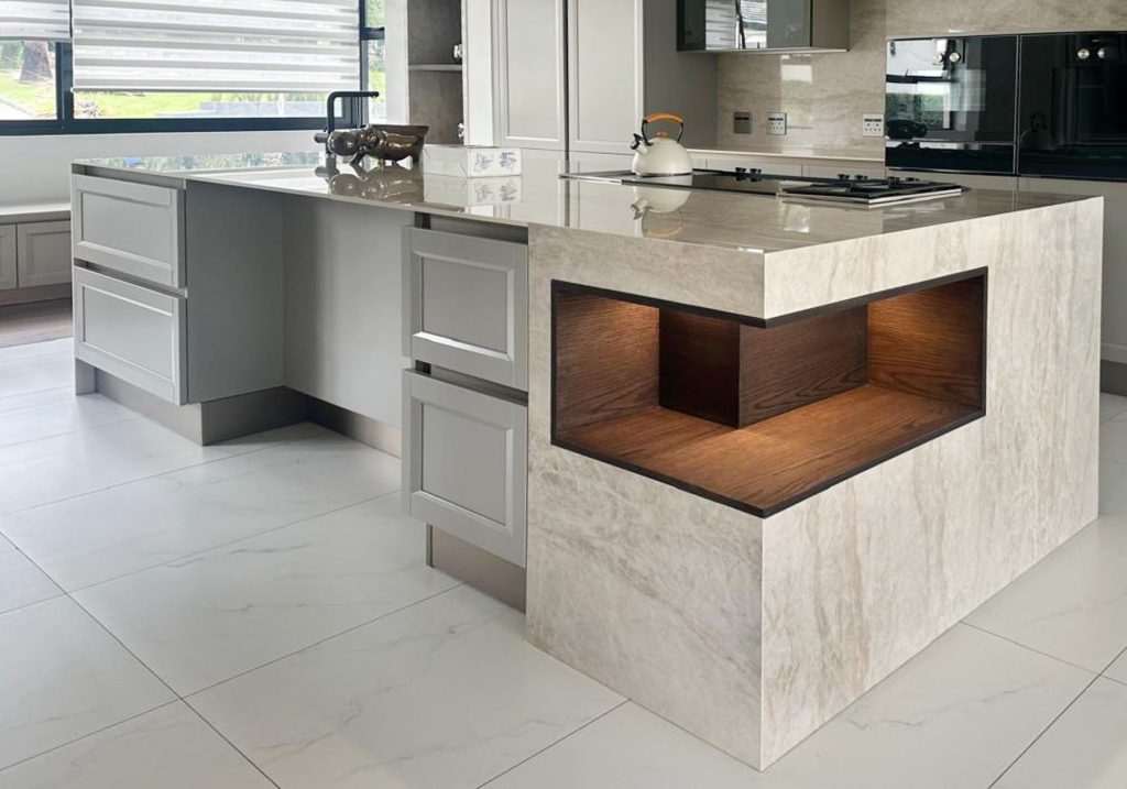 Custom stone kitchen island with wooden shelf inlay by Trend Stone