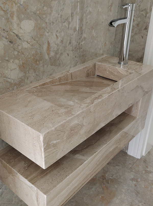 Trend Stone bathroom basin with custom stone cladding
