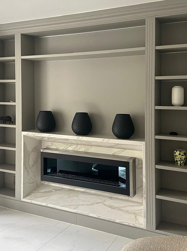 Trend Stone fireplace with custom stone cladding in living area